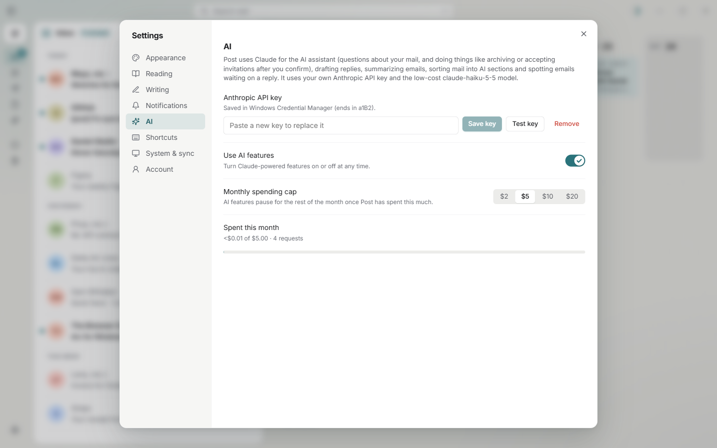 AI settings with an API key field, an on/off switch and a monthly spending cap