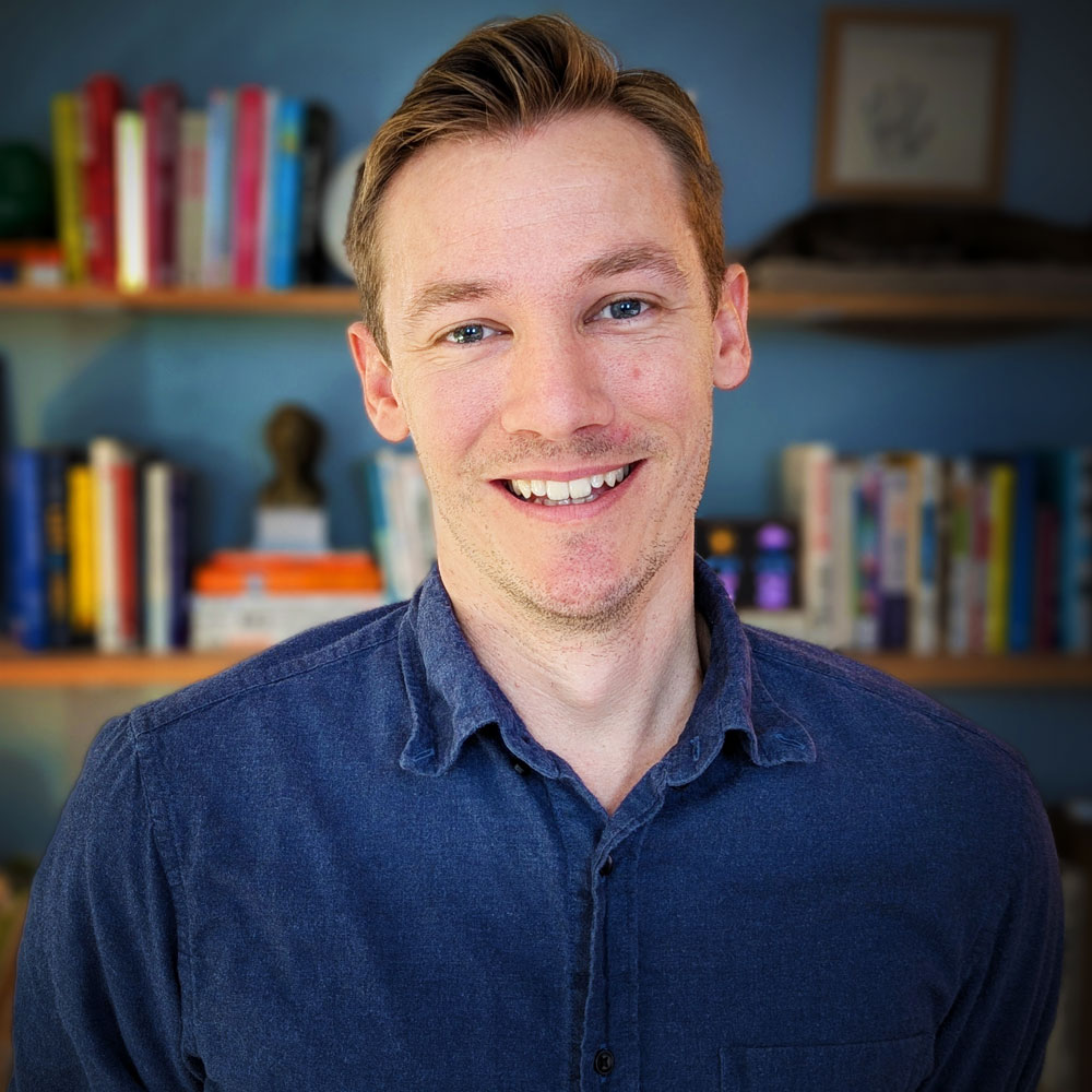 Portrait of Nate Bauer smiling.